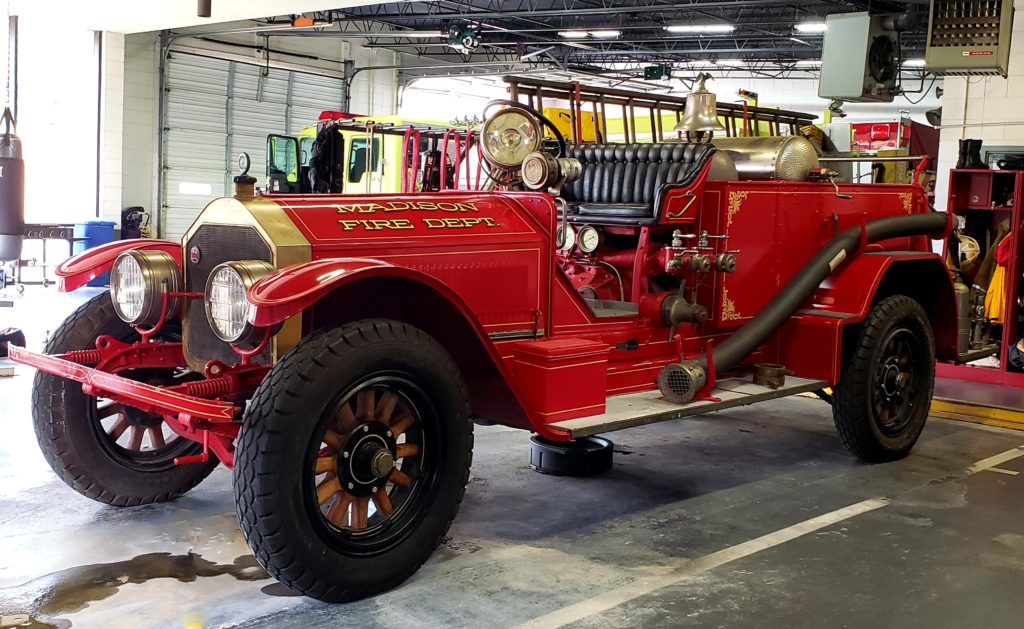 Restored antique fire engine in fire department garage