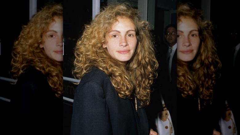 Young Julia Roberts with curly hair