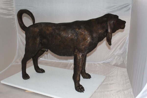 Hound dog Bronze Statue -  Size: 38"L x 12"W x 26"H.