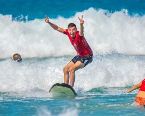 Person surfing in Noosa