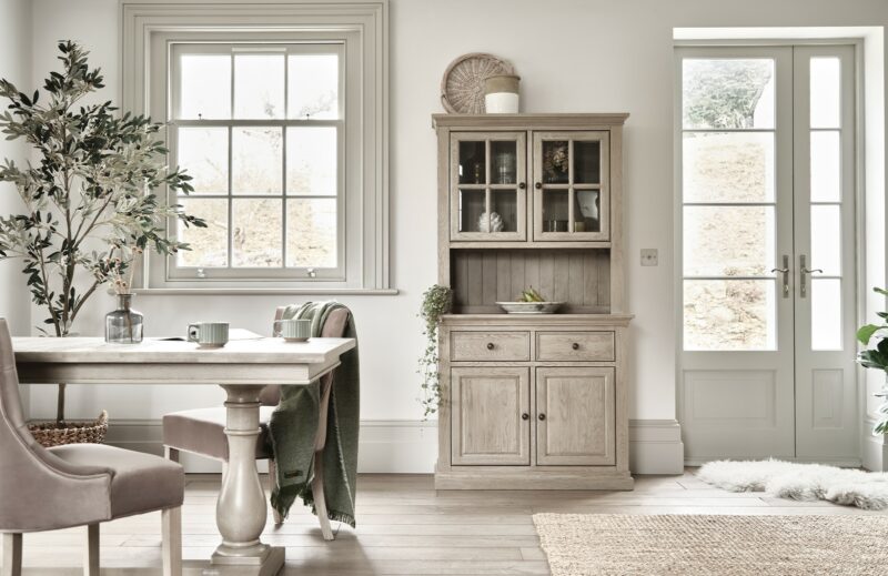 Oak Furnitureland weathered oak Burleigh dresser in a dining room with a matching table.