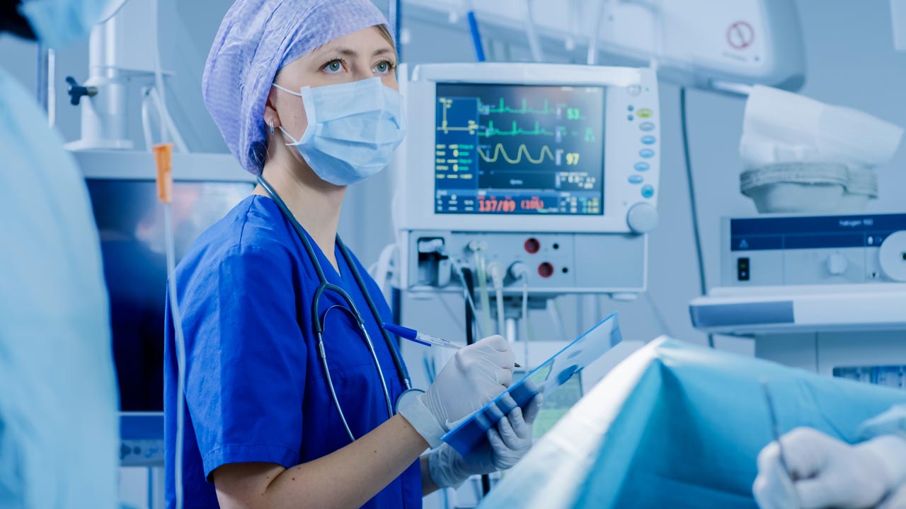 Anesthesiologist assistant in an operating room.