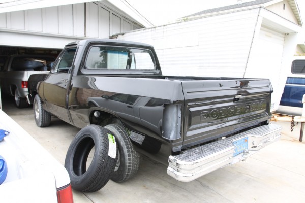 rear view of an old dodge d150 truck