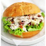 gluten-free apple cranberry chicken salad on a gluten-free bun