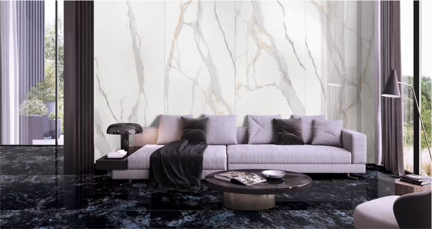 Living room with marble wall tiles, dark floor tiles, gray sofa, and round coffee table