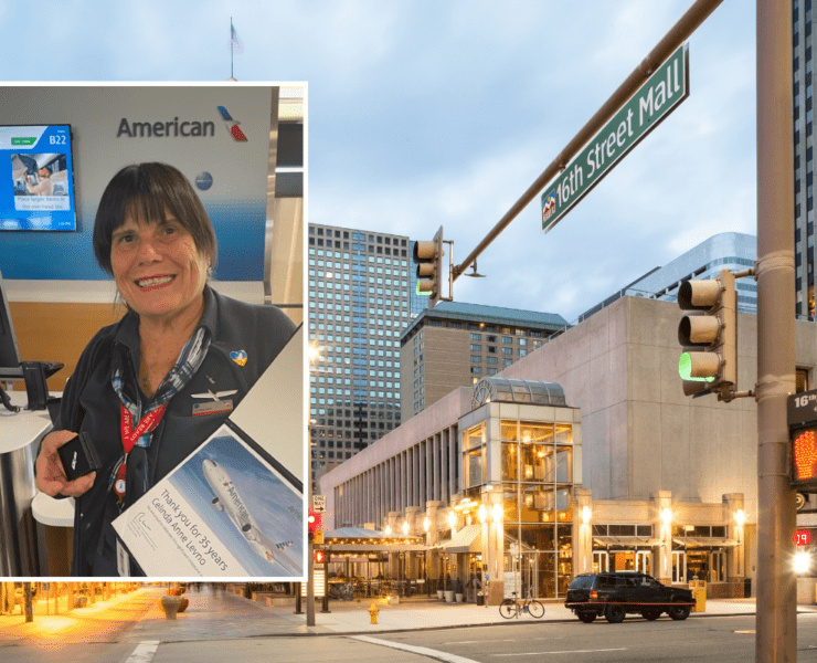 a street sign and a woman on the corner of a street