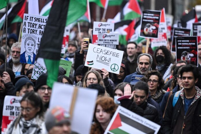 ‘Stop Genocide in Gaza’: Pro-Palestinian demonstrators rally across ...