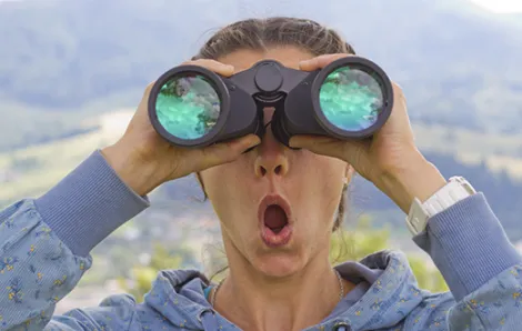 Girl with binoculars