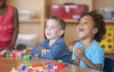 Preschoolers playing with blocks