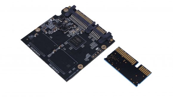 Photo of the SL500 Mini's PCB in comparison to a Standard SSD - it's tiny in comparison