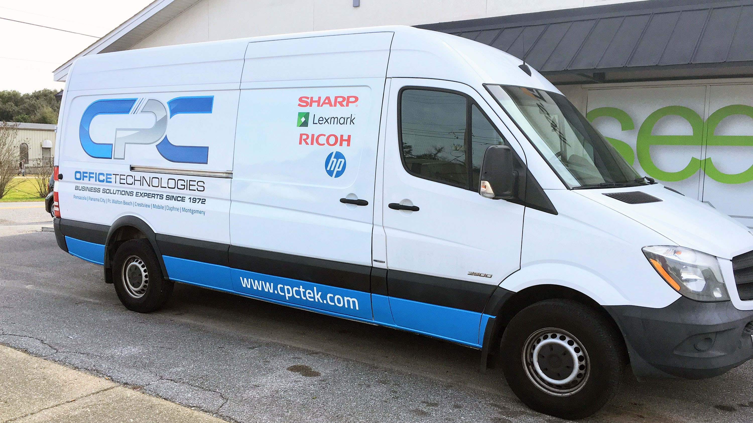 Printed graphics on CPC cargo van - Pensacola Sign vehicle graphics