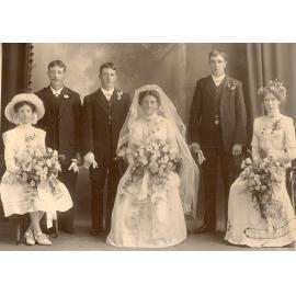 Formal portrait of bridal party of Ellen Harris and George Bullock, 1912