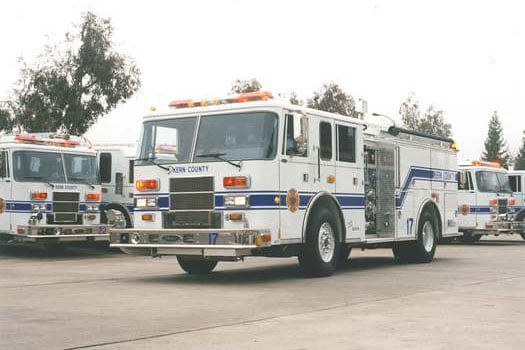 Pierce Manufacturing Lance fire apparatus parked outside in a parking lot. 