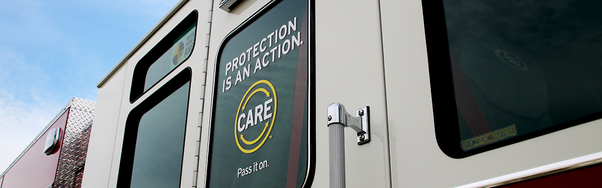 Care Initiative Graphic on the exterior window of a Pierce Fire Truck.