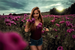 long hair women outdoor in flower field 4k 1653333686