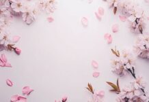 Spring Flowers Desktop Wallpaper HD with a flat lay of colorful spring blossoms on a white background.