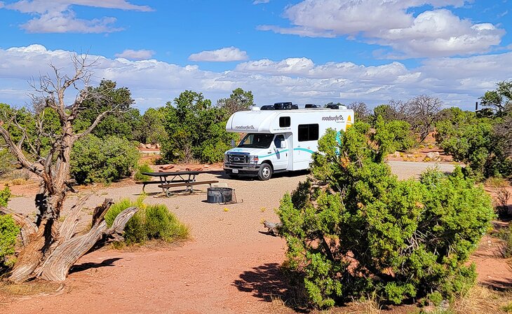 An RV at a campsite in Horsethief Campground