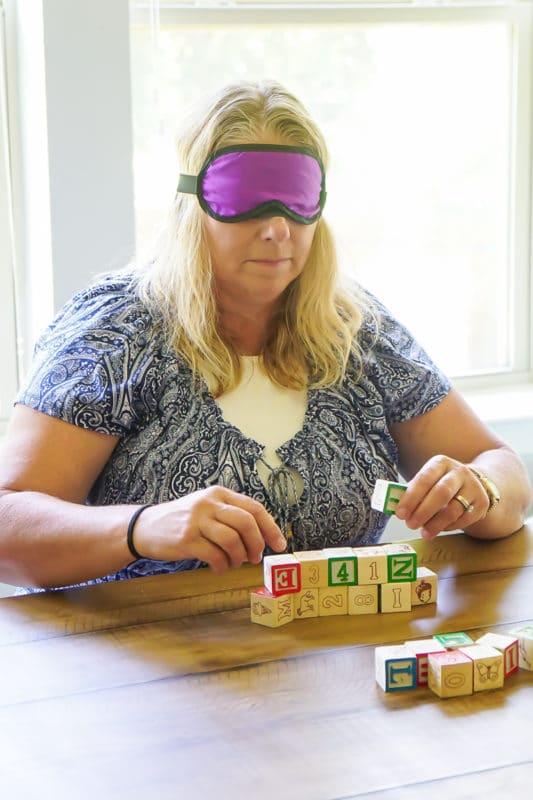 Blindfolded blocking is one of the best baby shower games