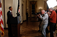 Photographers take pictures of U.S. President Barack Obama after he announced live on television the death of Osama bin Laden, from the East Room of the White House in Washington May 1, 2011. (Jason Reed/Reuters)