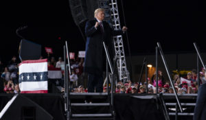 President Donald Trump reacts to the music as he walks off stage after speaking at a campaign rally at Pittsburgh International Airport on Tuesday. (AP Photo/Evan Vucci)