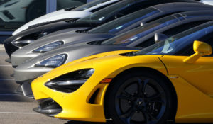 Unsold 720s sports cars sits at a McLaren dealership Sunday, Nov. 15, 2020, in Highlands Ranch, Colo. (AP Photo/David Zalubowski)