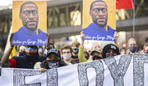 Protestors demonstrate downtown on Day One of the Derek Chauvin Trial on March 29, 2021 in Minneapolis, Minnesota. (Chris Tuite/ImageSPACE/MediaPunch)