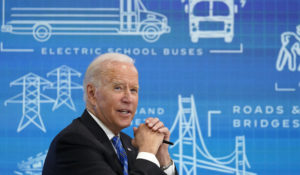 President Joe Biden speaks during a virtual meeting from the South Court Auditorium at the White House complex in Washington, Wednesday, Aug. 11, 2021, to discuss the importance of the bipartisan Infrastructure Investment and Jobs Act. (AP Photo/Susan Walsh)