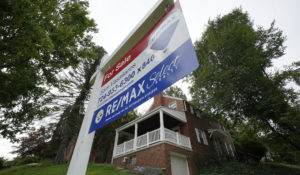 This is a home for sale in Mount Lebanon, Pa., on Tuesday, Sept. 21, 2021.  Homebuilders and other real estate companies are increasingly betting that would-be homebuyers frustrated with a shortage of homes for sale and runaway prices will settle for renting their slice of the American Dream.  While individual homeowners and mom-and-pop investors still account for the vast majority of single-family rental homes, homebuilders have stepped up construction this year of new houses being built for rent.(AP Photo/Gene J. Puskar)