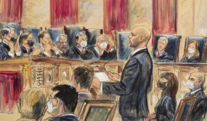 This artist sketch depicts lawyer Scott Keller standing to argue on behalf of more than two dozen business groups seeking an immediate order from the Supreme Court to halt a Biden administration order to impose a vaccine-or-testing requirement on the nation's large employers during the COVID-19 pandemic, at the Supreme Court in Washington, Jan. 7, 2022. (Dana Verkouteren via AP, File)