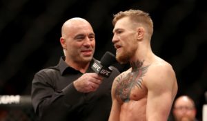 Joe Rogan interviews Conor McGregor after McGregor defeated Dennis Siver at UFC Fight Night, Sunday, Jan. 18, 2015 in Boston.   (AP Photo/Gregory Payan)