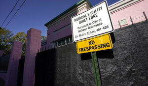 A sign indicating a "Medical Facility Quiet Zone" is displayed outside the Jackson Women's Health Organization clinic in Jackson, Miss., the state's only state licensed abortion facility, Wednesday, Nov. 18, 2020. (AP Photo/Rogelio V. Solis, File)