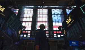 Traders work on the floor at the New York Stock Exchange in New York, Friday, July 1, 2022. (AP Photo/Seth Wenig)