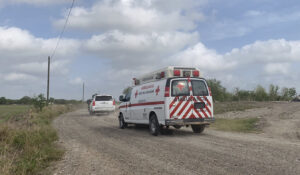 A Mexican Red Cross ambulance transports two Americans found alive after their abduction in Mexico last week, in Ejido Longoreno, on the outskirts of Matamoros, Mexico, Tuesday, March 7, 2023. Two of four Americans abducted March 3 when they got caught in a cartel shootout were found dead while the two surviving Americans, one wounded, were transported in an ambulance to the border near Brownsville, Texas. (AP Photo)