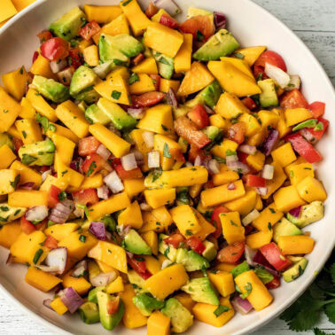 A square image of mango avocado salsa.