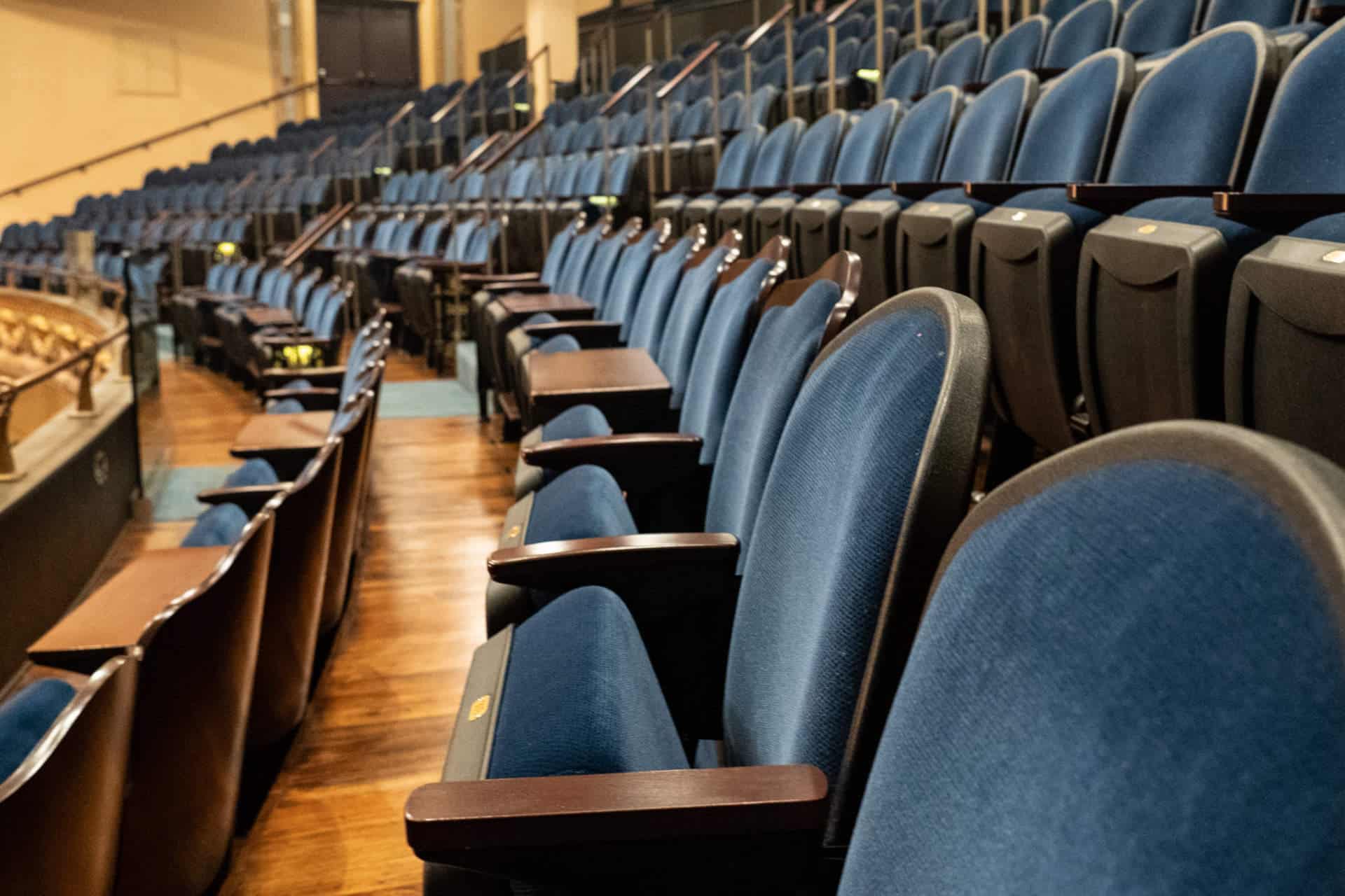 Empty row of chairs in a lecture hall