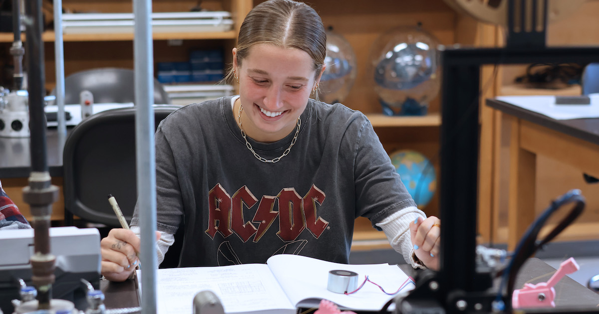 Mackenzie Bartsch, a senior biochemistry major from Birdsboro, Pa., is conducting research on magnetic jamming of materials in hopes of developing low-cost prosthetic hands.