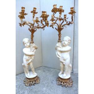 Important Pair Of Candelabra With Cherubs.