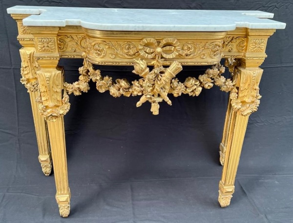 Console en bois doré style Louis XVI 