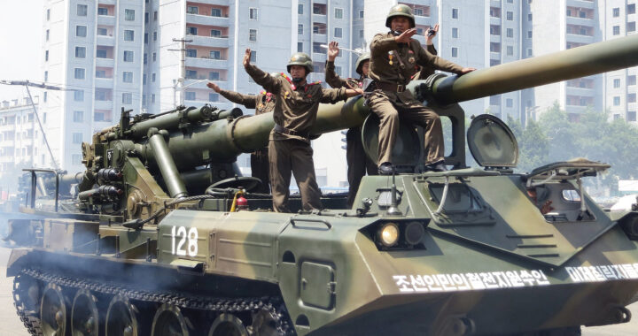 North Korean soldiers on an artillery tank for the article "Fate of North Korean Soldiers in the Russia-Ukraine War"