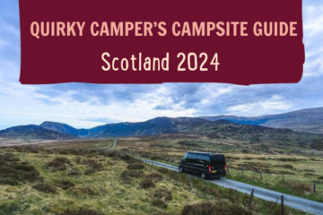 A scenic image with a black camper van driving along a narrow road through a vast, rugged landscape in Scotland. The sky is cloudy with hints of blue showing through. Text overlay reads "QUIRKY CAMPER'S CAMPSITE GUIDE Scotland 2024" in bold letters.