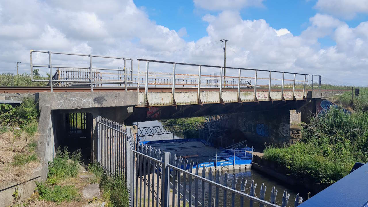 The bridge with a pontoon platform underneath in preparation for the work