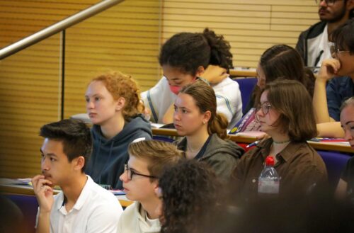 Students sitting in a lecture at a university.