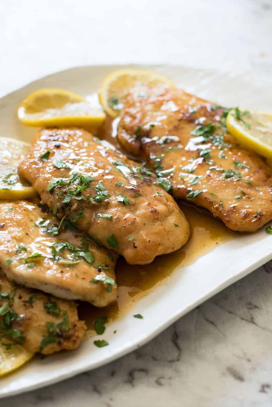 Honey Lemon Chicken - Golden brown chicken breast with a gorgeous honey lemon sauce. On the table in 15 minutes! recipetineats.com