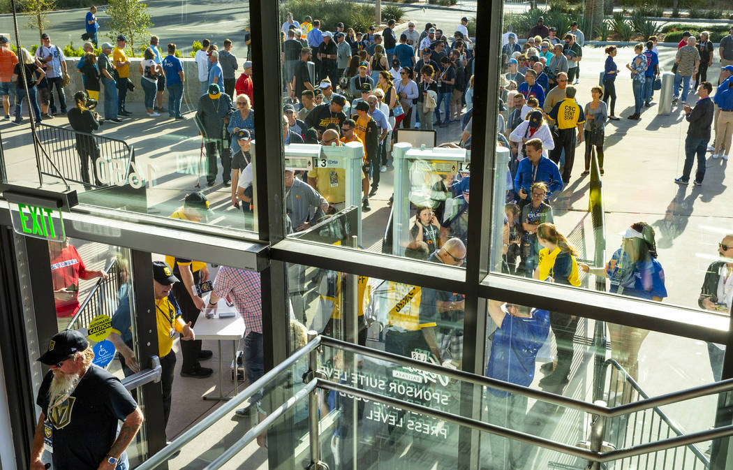 Fans wait in line to enter before the Las Vegas Aviators home opener on Tuesday, April 9, 2019. ...