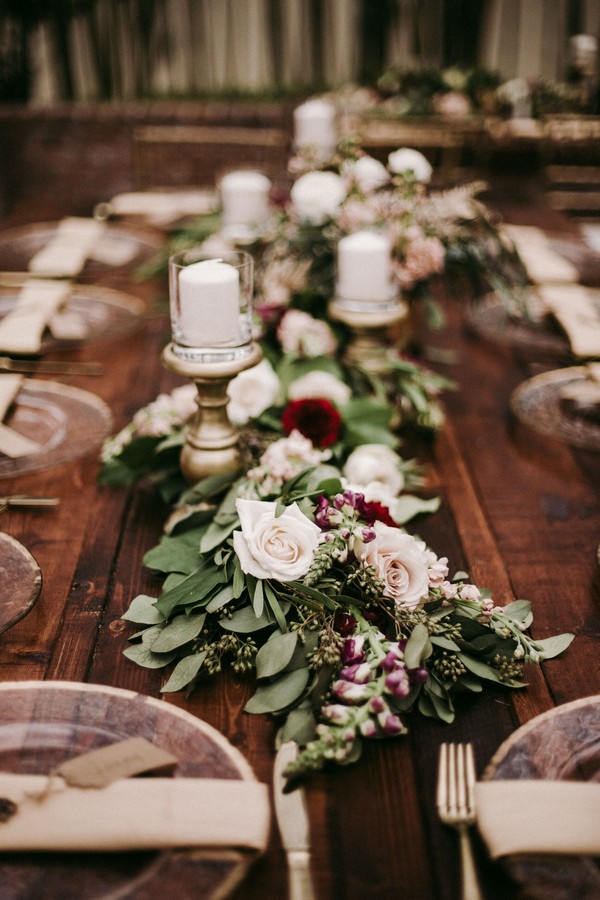 lush garlands of lemon leaf, seeded eucalyptus, willow eucalyptus filled with vendela roses, quicksand roses