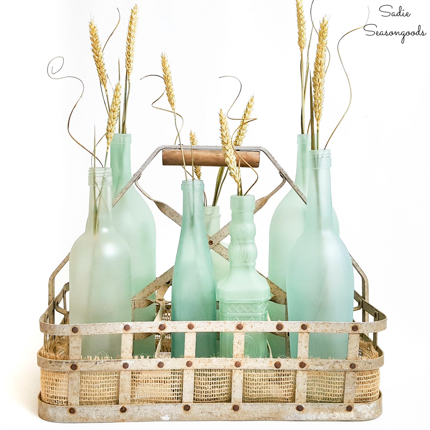 Sea glass bottles as wine bottle crafts for coastal decor