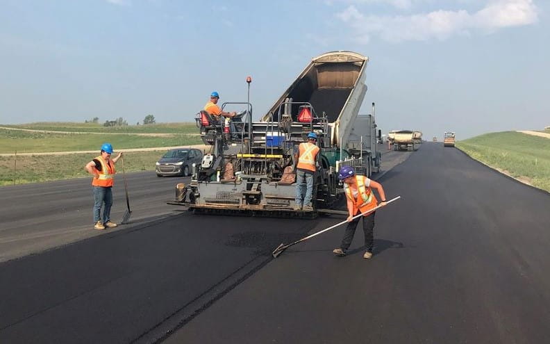 Road crew paving on Highway 5