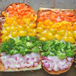 Rainbow French Bread Pizza on a Baking Sheet