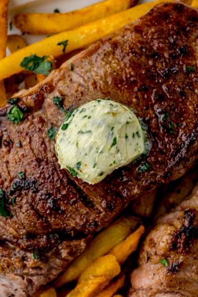 close up of melting butter on a steak