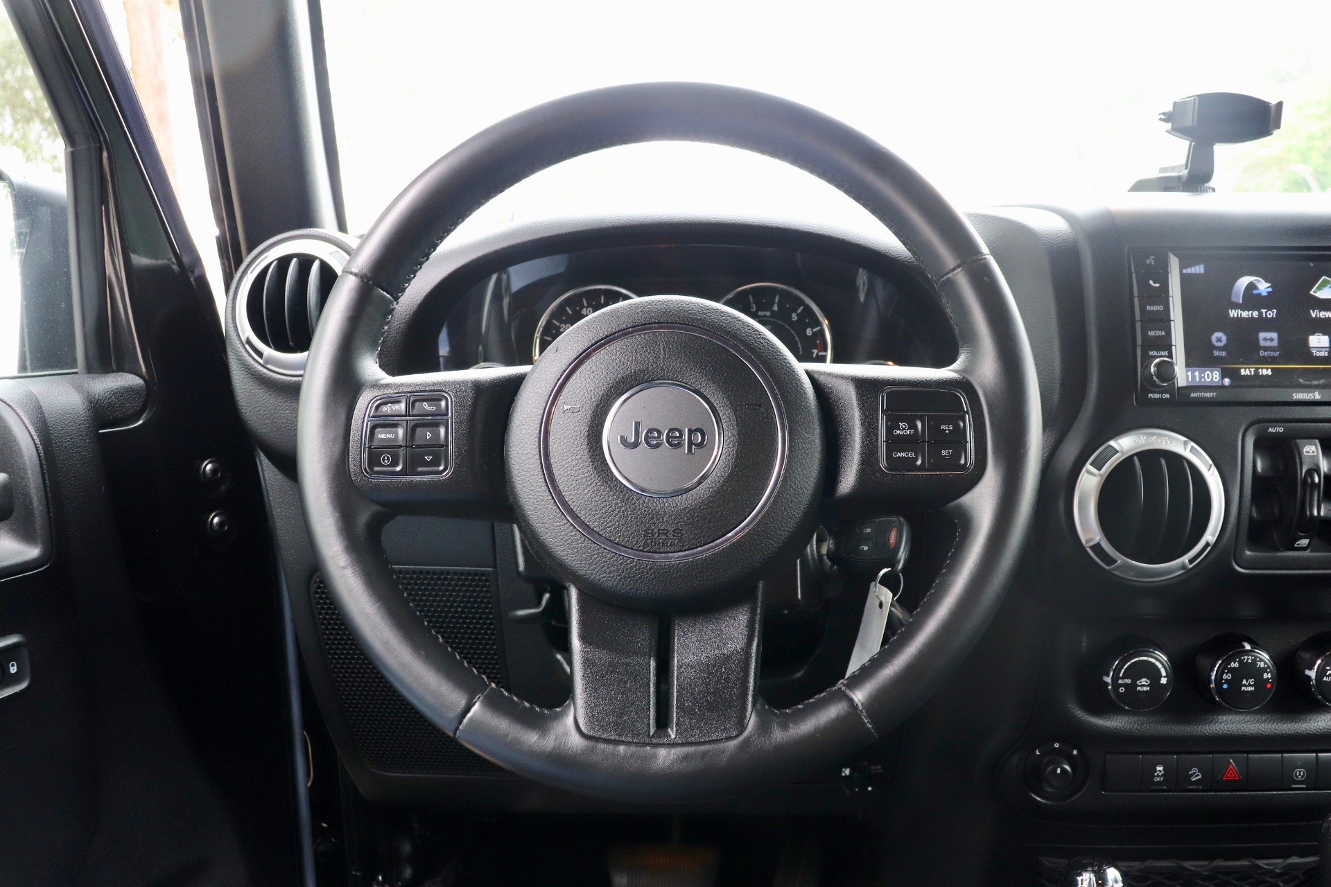 Used-2015-Jeep-Wrangler-Unlimited-Sahara